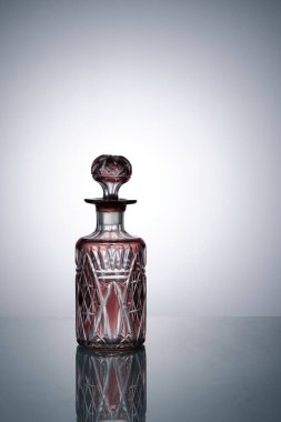A beautiful glass bottle for perfumery. Bohemian crystal. Close-up. Copyspace