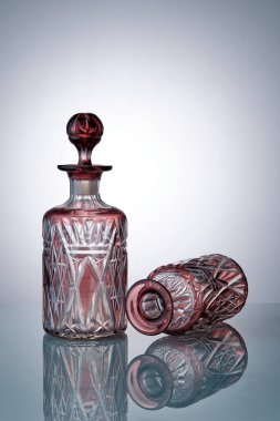 Two beautiful glass perfume bottles. Bohemian crystal. Close-up. Copyspace