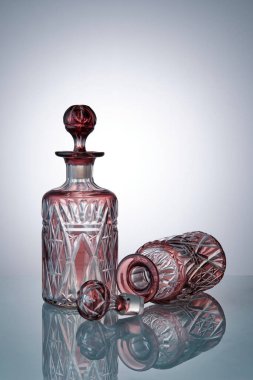 Two beautiful glass perfume bottles. Bohemian crystal. Close-up. Copyspace