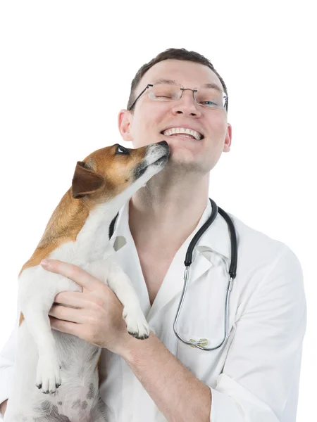 Cão lambendo um veterinário — Fotografia de Stock