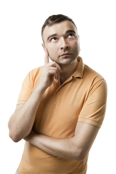 Young man looking to the side thoughtfully. — Stock Photo, Image