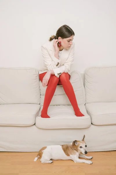 Girl Setting Sofa Looking Sad Pose Mood Beige Red Small — Stock Photo, Image