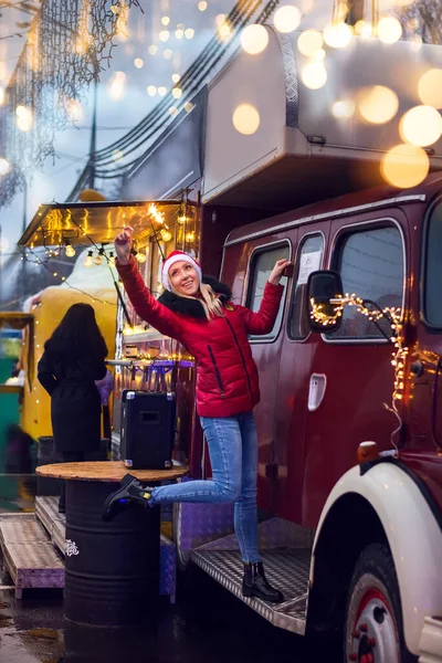 Girl Sparklers Red Santa Hat Standing Truck Fair Night City —  Fotos de Stock