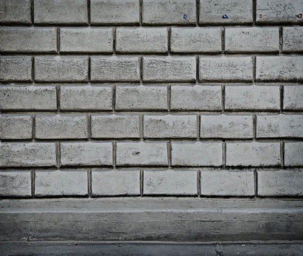 스트립 아스팔트 블록에서 회색 벽. — 스톡 사진