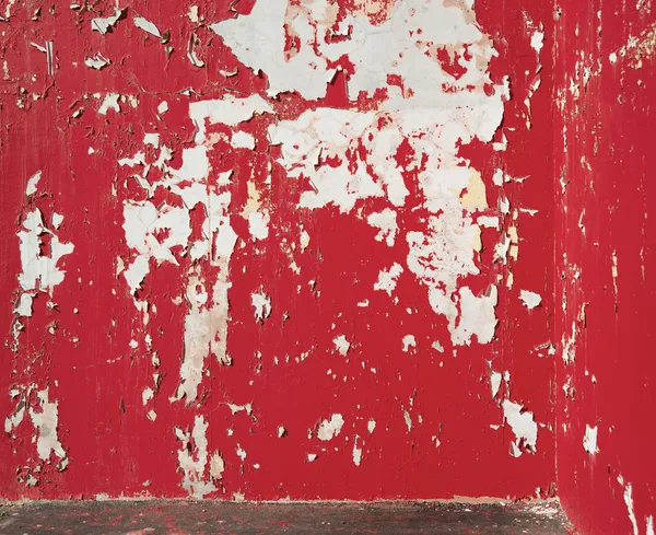 Pozadí loupané červené karmínové barvy na zeď. — Stock fotografie