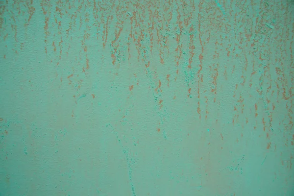 Aged green painted wall background with pink drips — Stock Photo, Image