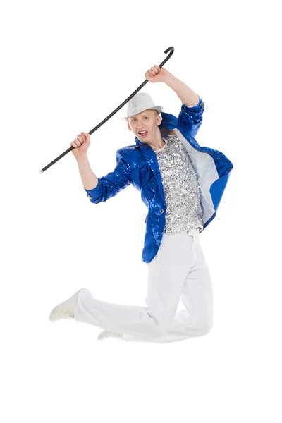 Man dancer in the blue sparkle suit and white trousers jumping — Stock Photo, Image