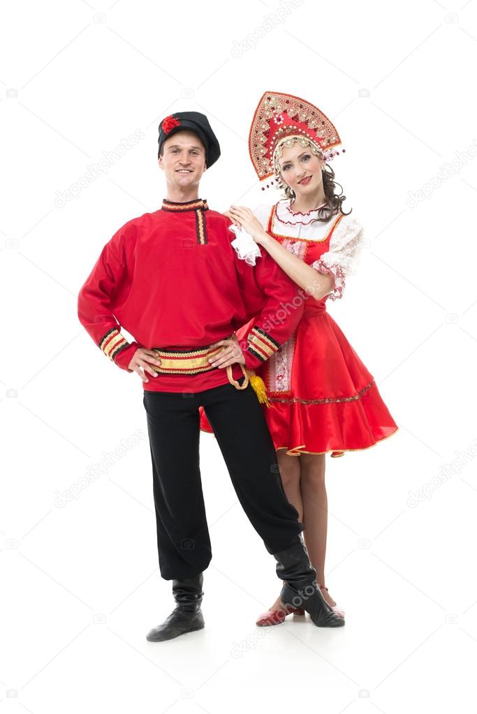 Couple of dancers in russian traditional costumes