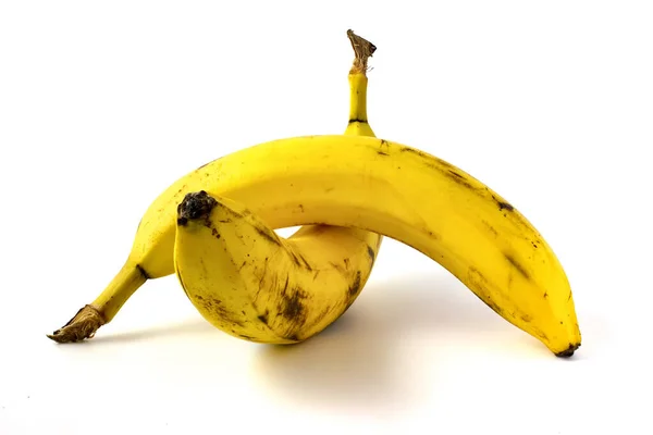 Два Банани Чорними Плямами Ізольовані Білому Тлі Плоди Які Починають — стокове фото