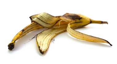 Beyaz arka planda muz kabuğu. İzole gıda atıkları