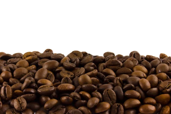 コピースペースのための白いスペースとローストコーヒー豆 — ストック写真