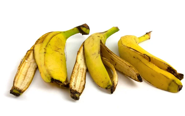 Drie Schillen Van Bananen Die Beginnen Rotten Organisch Fruitafval Geïsoleerd — Stockfoto