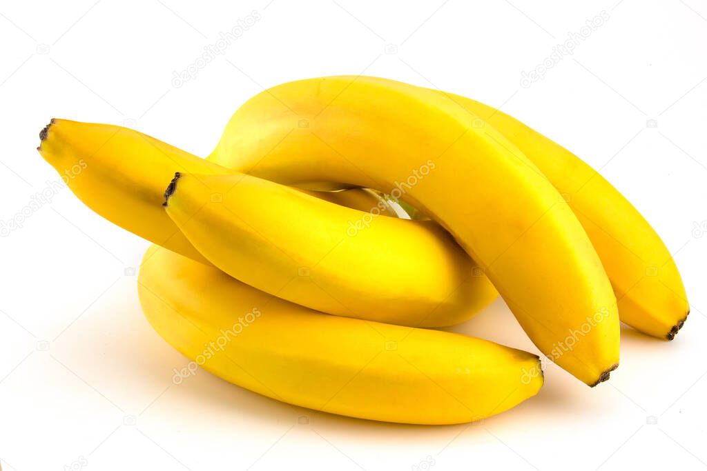 Ripe bananas isolated on white background. A bunch of fruits lie on white