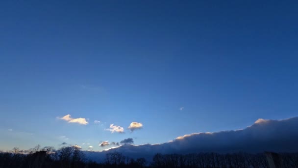 Time Lapse Dark Clouds Obscure Evening Sun Sunset Clear Blue — Stockvideo
