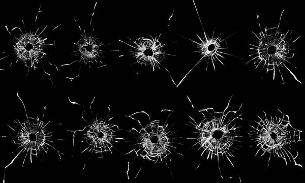 Группа пулевых отверстий на стеклянном окне абстрактного фона. Текстура для дизайнерского набора из разбитого стекла.