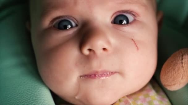 Close Childs Face Little Baby Shaking Impatience Drooling Mom Wipes — Stock Video