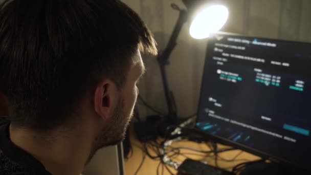 Hacker Installs Breaks Program Looking Computer Screen Table Lamp View — Stock Video