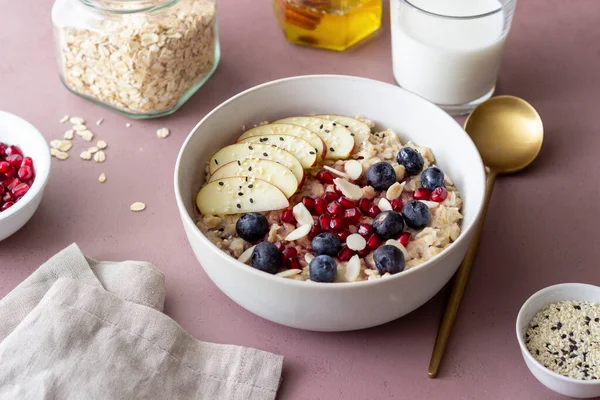 Oatmeal Porridge Apple Pomegranate Blueberries Almonds Healthy Eating Vegetarian Food — Stockfoto