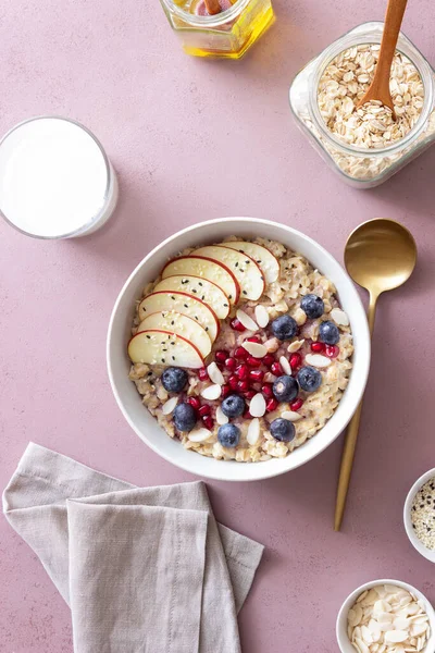 Oatmeal Porridge Apple Pomegranate Blueberries Almonds Healthy Eating Vegetarian Food — Stockfoto