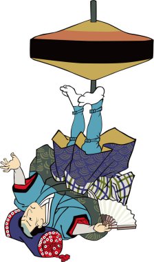 Bir adam büyük bir top çeviriyor.