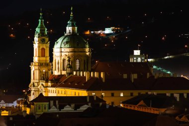 Prague at night, view of the Basilica of St. Mikulas, cityscape