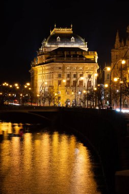 Prague at night, National Theater, reflection of lights in the river