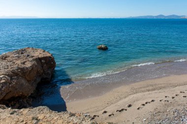 Yunanistan Ege Denizi, Atina seti, kumdaki ayak izleri