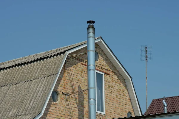 One Gray Long Metal Pipe Chimney Brown Brick Loft Windows — Stock Photo, Image