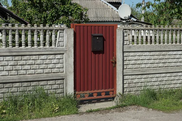 One Red Closed Metal Door Black Mailbox Gray Wall Concrete — 图库照片