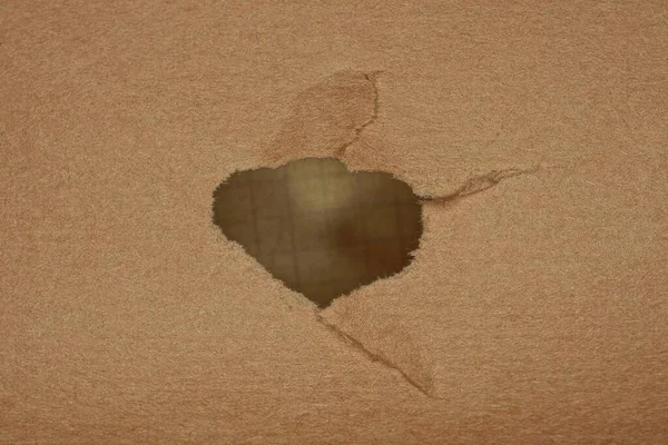 One Big Gray Hole Piece Brown Paper Cardboard — Stockfoto