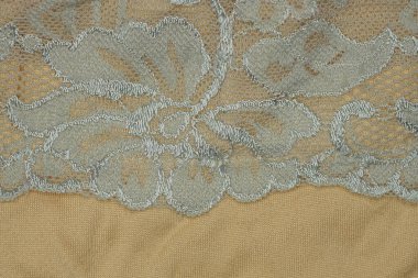 Kalıplı bir kumaş parçasından gri kahverengi doku.