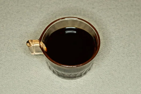 One Glass Cup Brown Soy Sauce Stands Gray Table — Stock Fotó