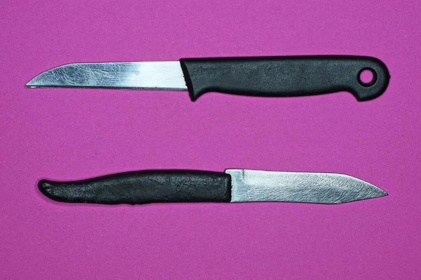 Two Small Knifes Black Plastic Handles White Metal Blades Lie — Stock Photo, Image