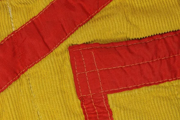 Жовта Червона Смугаста Тканина Текстури Старого Шматка Одягу Швами — стокове фото