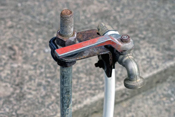 One Metal Water Tap White Hose Iron Pipe Background Gray — Stockfoto