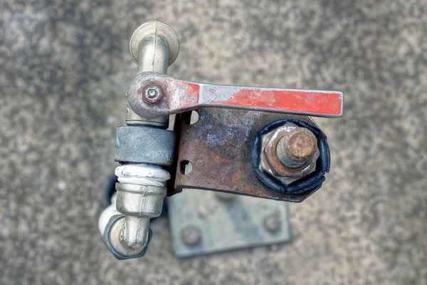 One Gray Water Faucet Red Metal Handle Outdoors Gray Background — Fotografia de Stock