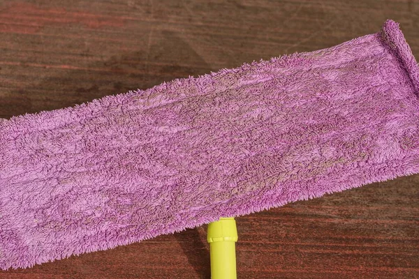 One Purple Cloth Mop Lies Brown Dirty Floor — Stock Photo, Image
