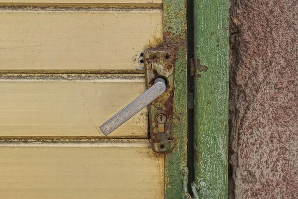 Old Gray Metal Doorknob Rust Green Iron Door Brown Concrete — Stock Photo, Image