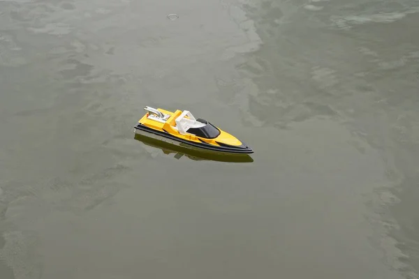 One Toy Colored Plastic Electric Radio Controlled Boat Floats Gray — Fotografia de Stock