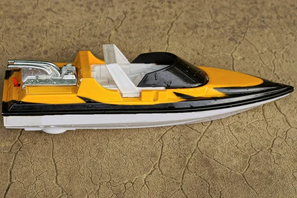One Colored Plastic Boat Radio Control Toy Lies Brown Table — Photo