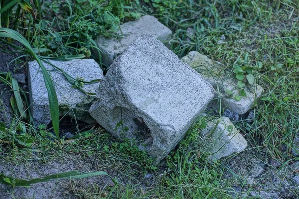 Pile Gray Pieces Stones Bricks Lies Ground Green Grass Street — Foto de Stock