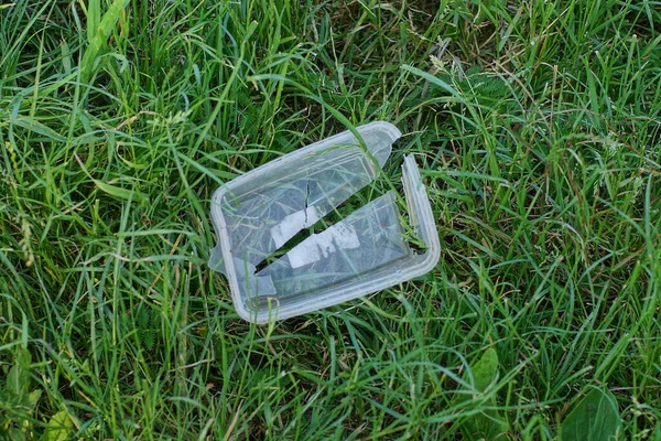 Garbage One White Plastic Packaging Box Lies Green Grass Ground — стоковое фото