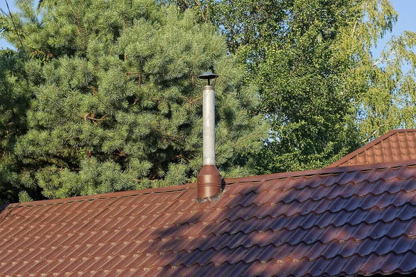 One Gray Metal Chimney Pipe Brown Tiled Roof Private House — Foto Stock
