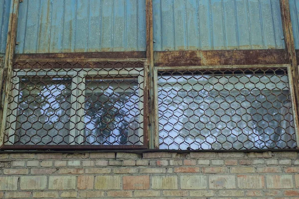 Two Old Windows Rusty Iron Grate Wall Brown Bricks Blue — 스톡 사진