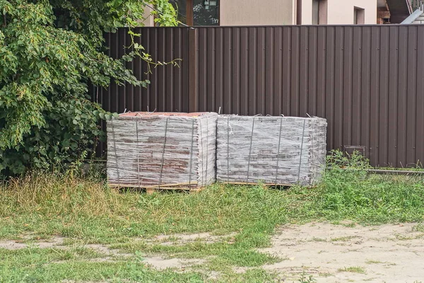Two Square Boxes Plastic Packaging Paving Bricks Stand Street Green — Fotografia de Stock
