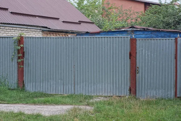 One Big Gray Closed Metal Gate Door Part Fence Street — Foto de Stock