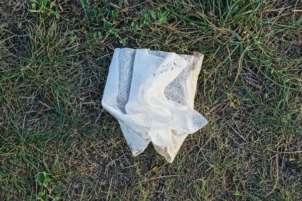 Garbage One White Dirty Crumpled Paper Napkin Lies Gray Ground —  Fotos de Stock