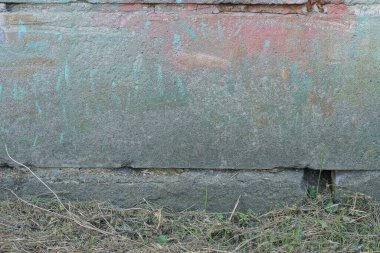 colored stone texture from old concrete wall in the dirty foundation