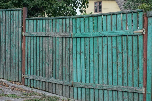 One Closed Old Wooden Green Gate Part Fence Rural Street — Stockfoto