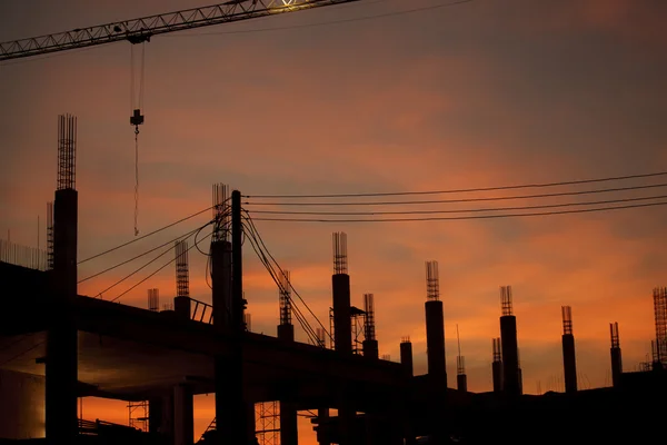 Construction site silhouettes — Stock Photo, Image